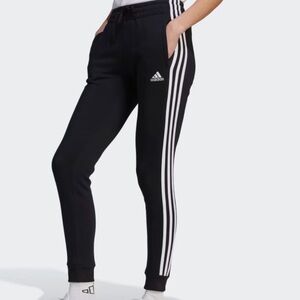 Adidas three-stripe women’s sweatpants